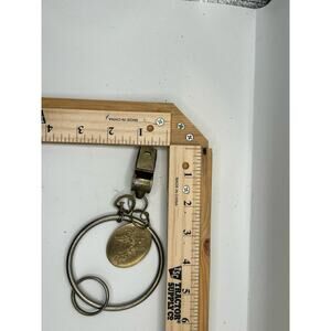 Vintage Brass Whistle Keychain with Angel Medallion Collectible Rustic Gift
